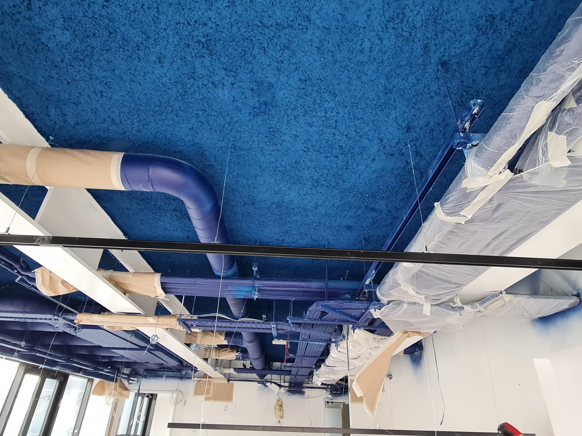 Acoustic Spray Plaster on Ceiling